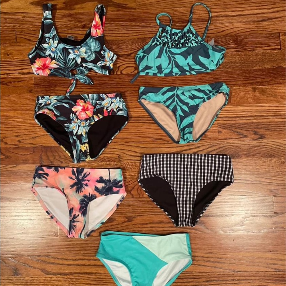 Girls size medium swim suits. Gently worn